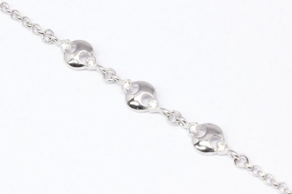 Pulsera de plata rodinada cadena rolo con3 eslabones gucci con 1 cubic en cada extremo el eslabón