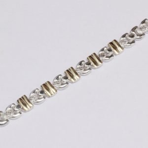 Pulsera Plata laq. con eslabon semi circulo y Cinco barras de oro en el centro por 18 cm de largo